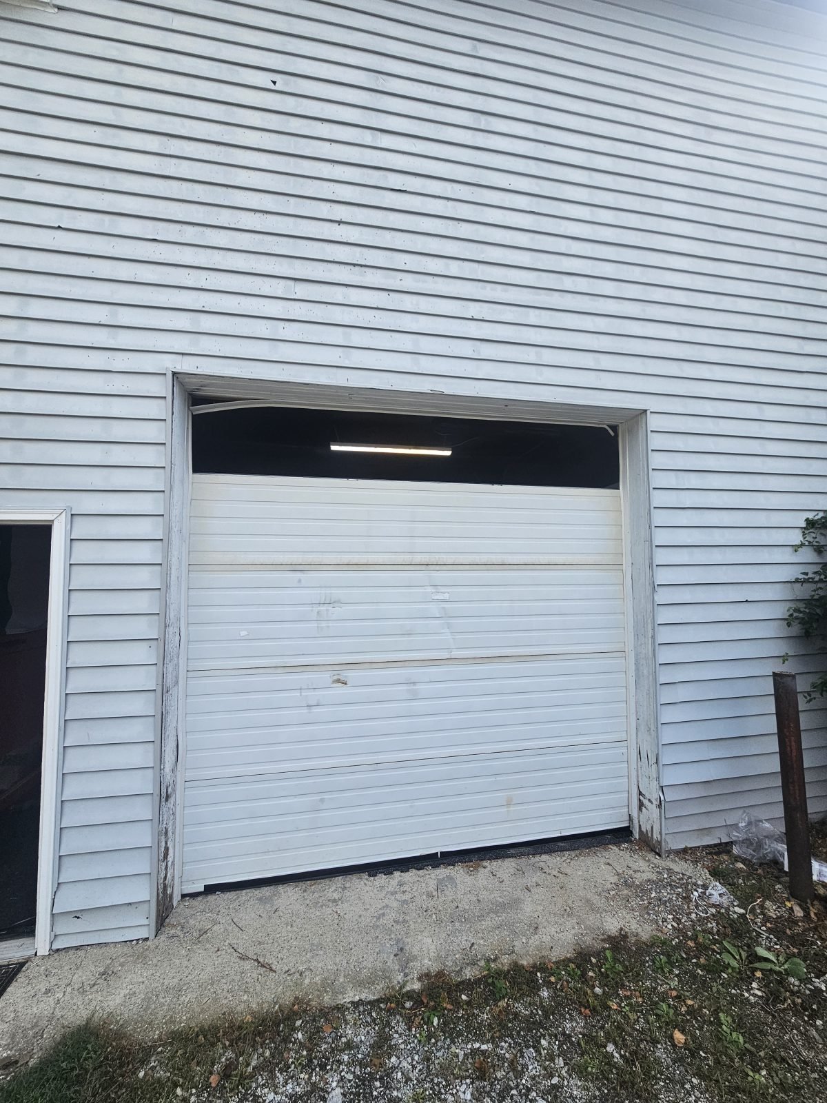 Garage door panel repair