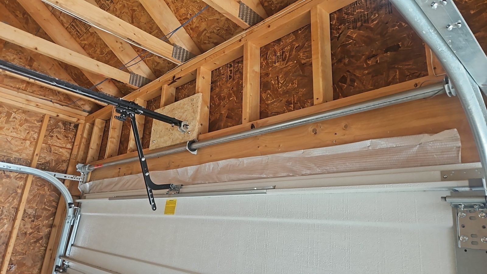 Garage door spring system replacement
