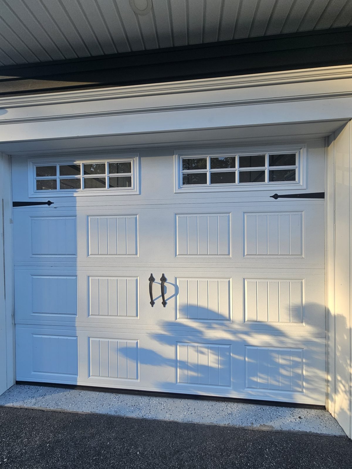 Garage door after bottom panel replacement in Burlington, MA