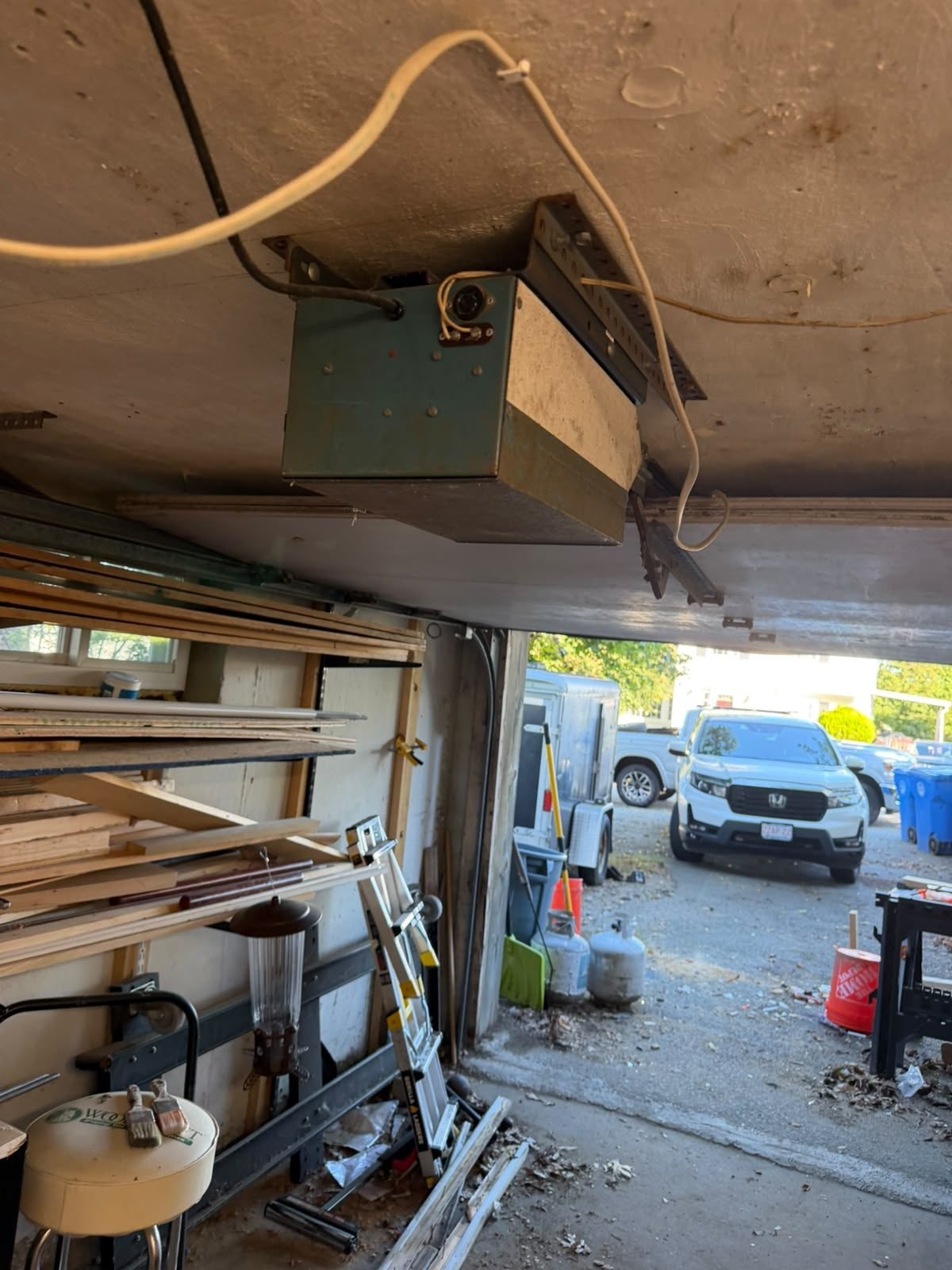 Old garage door opener before replacement in Waltham, MA