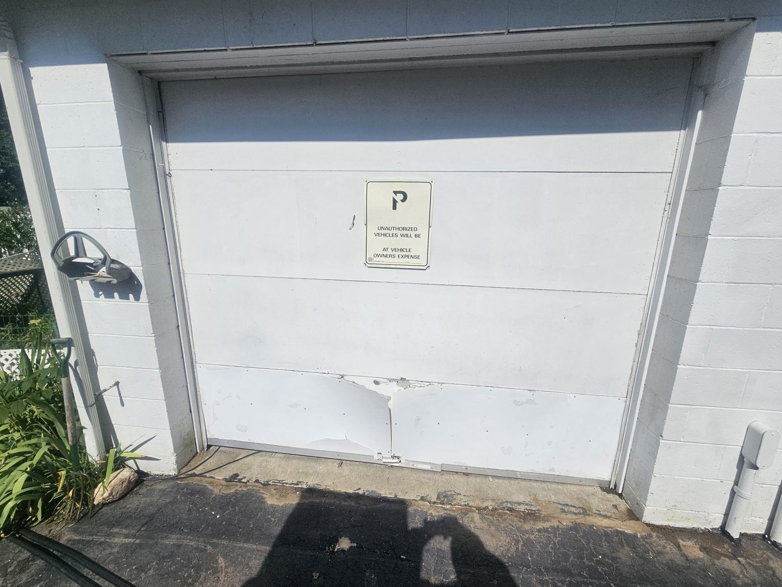 Garage door before replacement, door removed ahead of new installation